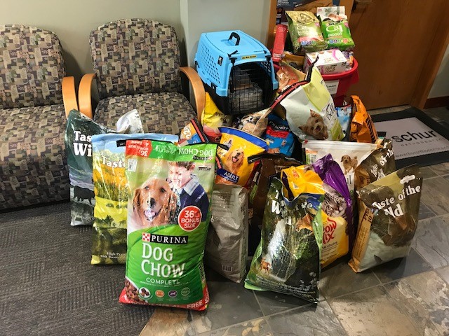 Bags of donated pet food.